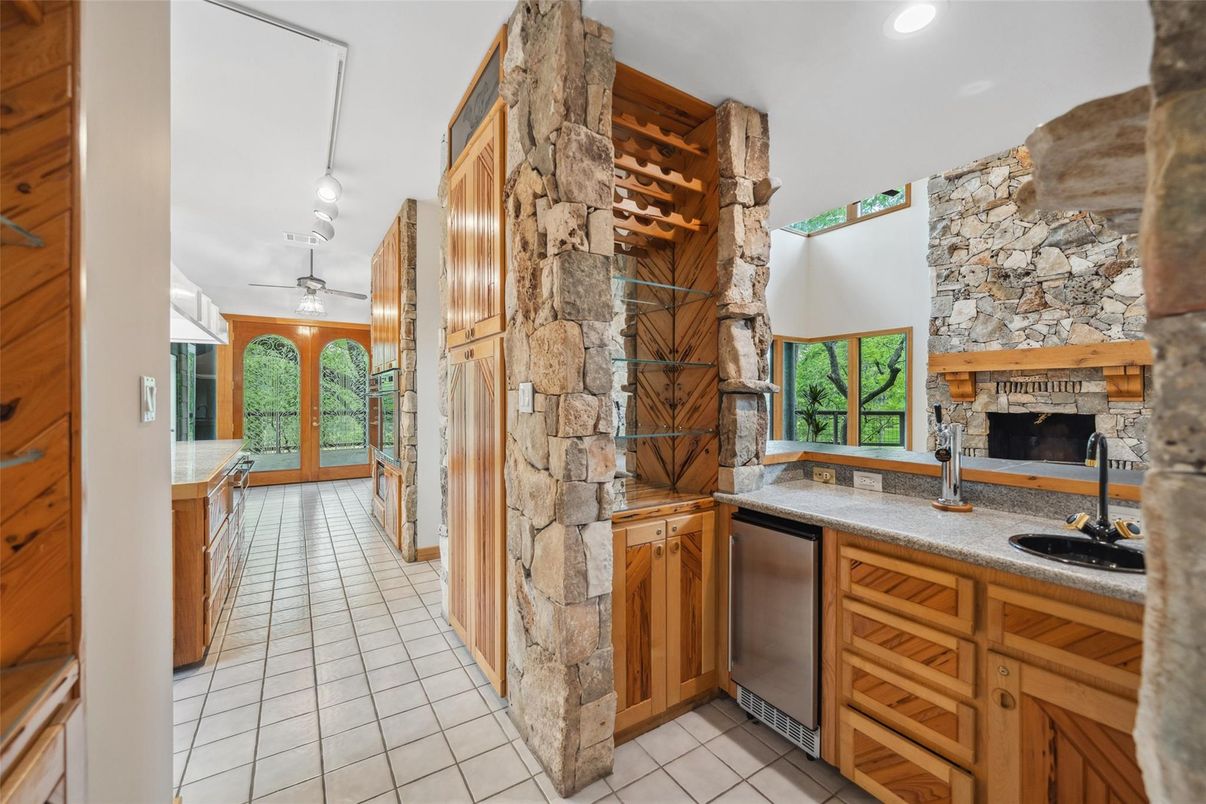 Fireplace, Interior, Kitchen, Recessed Lighting, Stone Walls