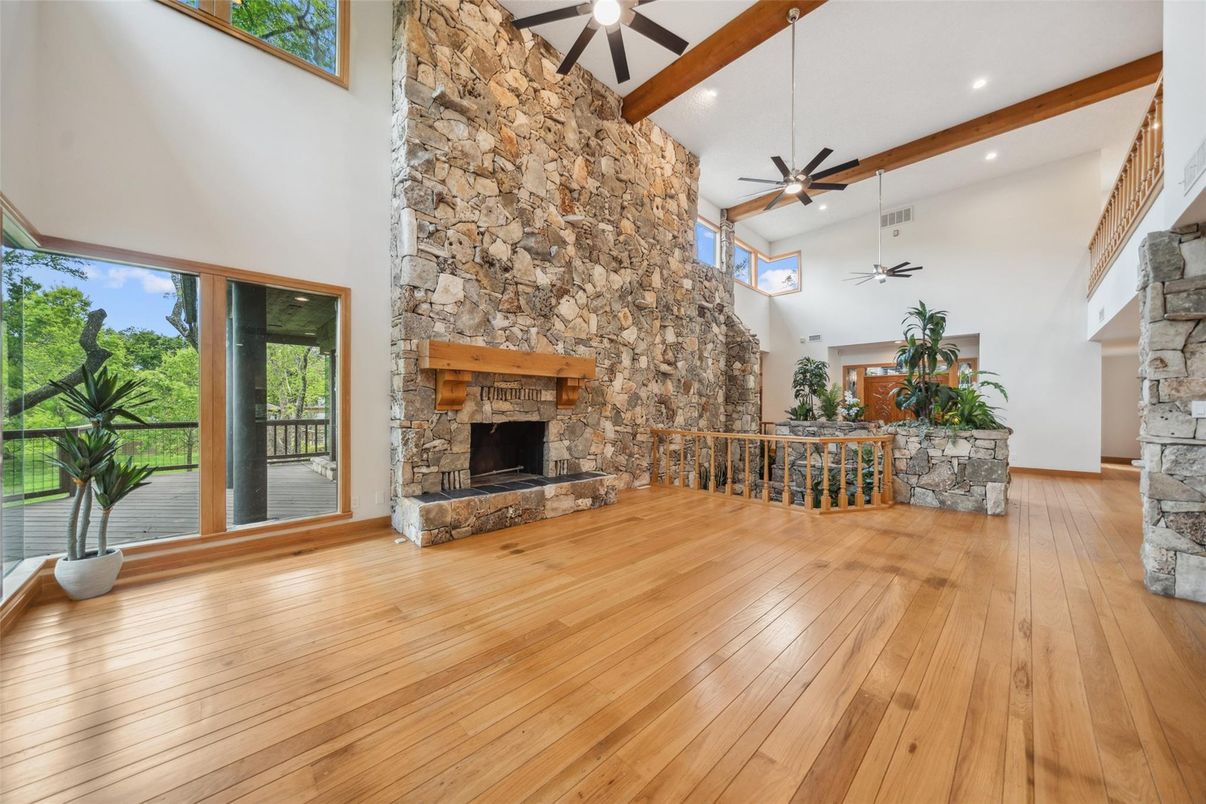 Fireplace, Interior, Recessed Lighting, Stone Walls, Wood Texture Flooring