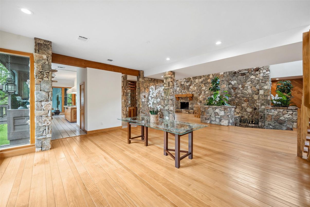 Fireplace, Interior, Recessed Lighting, Stone Walls, Wood Texture Flooring