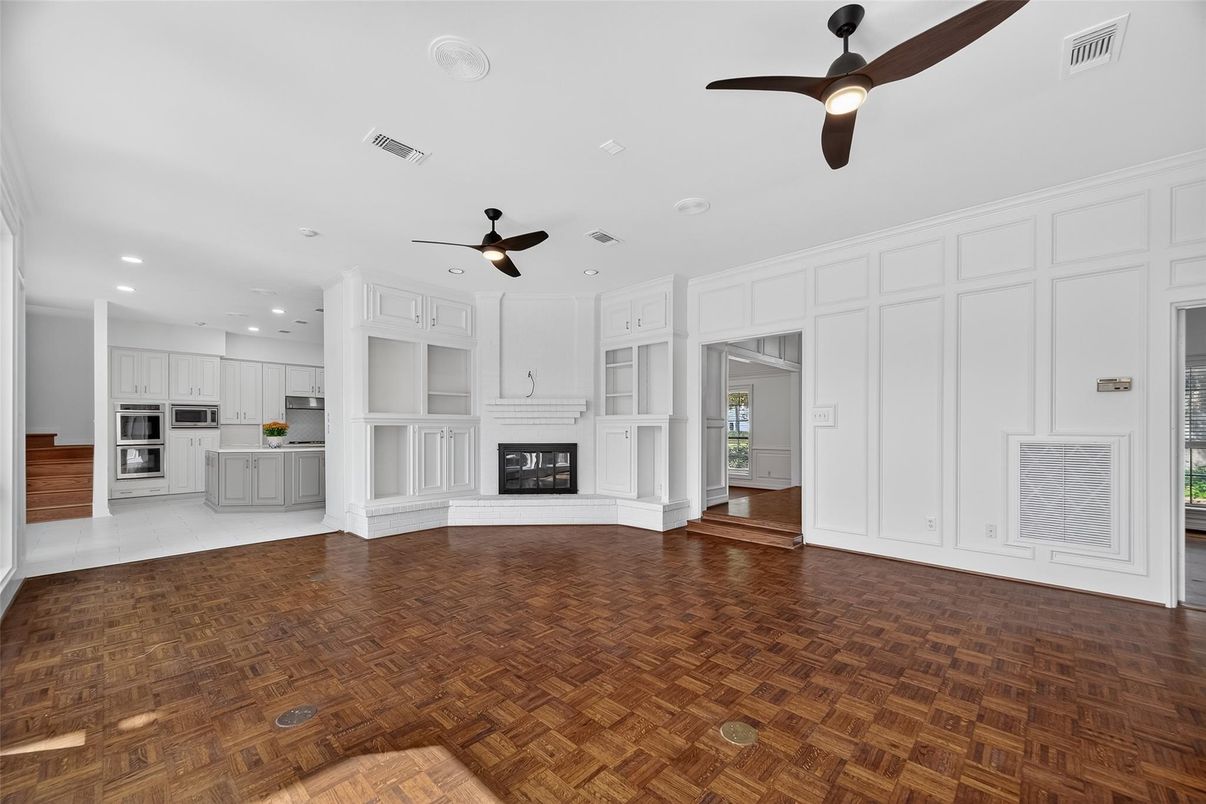 Empty room, Fireplace, Interior, Kitchen, Recessed Lighting, Wood Texture Flooring