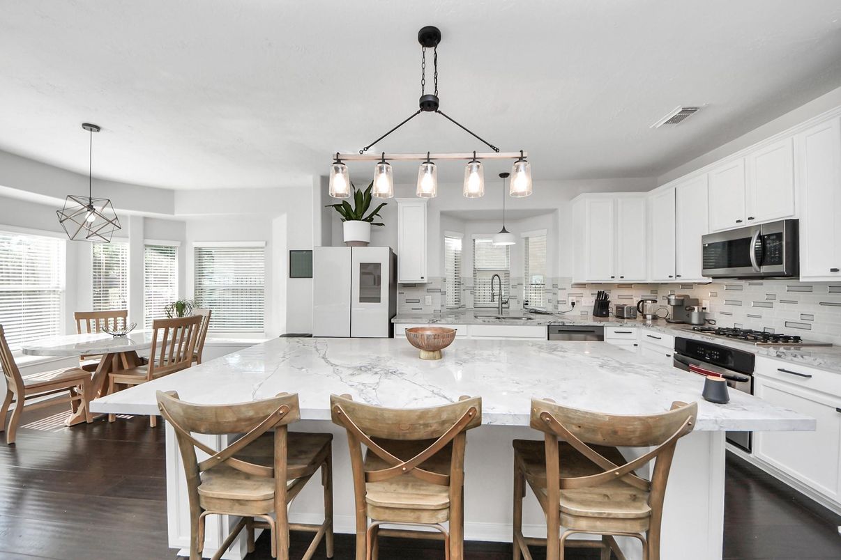 Dining room, Interior, Kitchen, Pendant Lights, Stainless Steel Appliances, Wood Texture Flooring