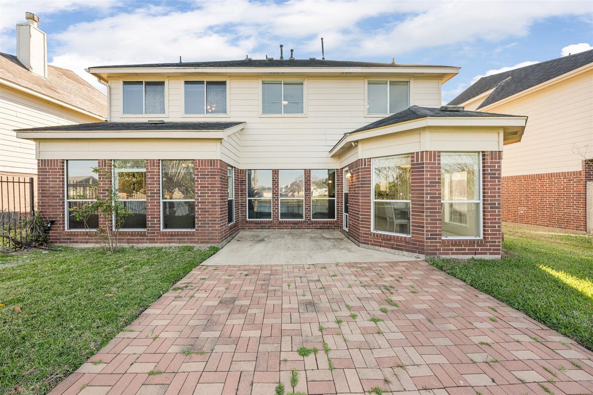 Backyard, Exterior, Facade, Brick Facade, American Foursquare