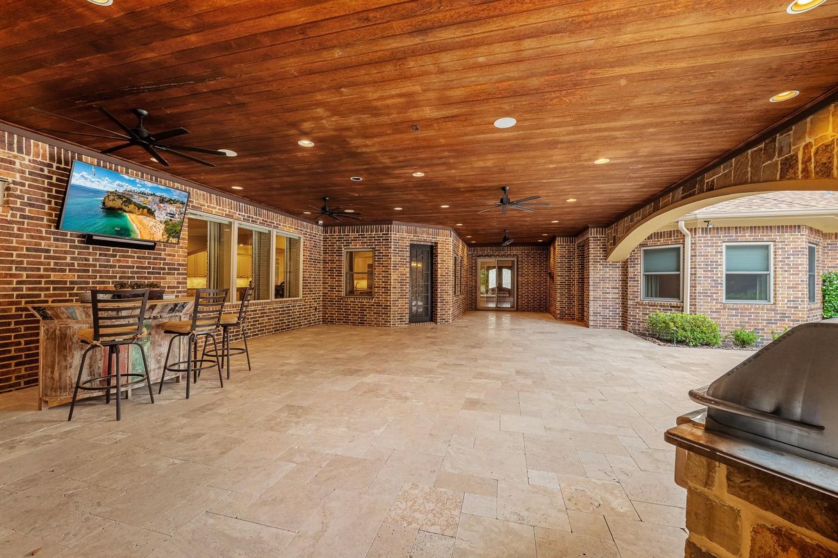 Exterior, Outdoor Kitchen, Recessed Lighting, Stone Walls