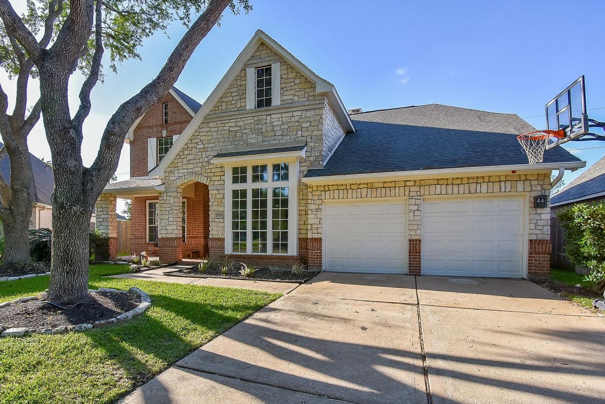 Attached, Exterior, Facade, Brick Facade, Brick Traditional