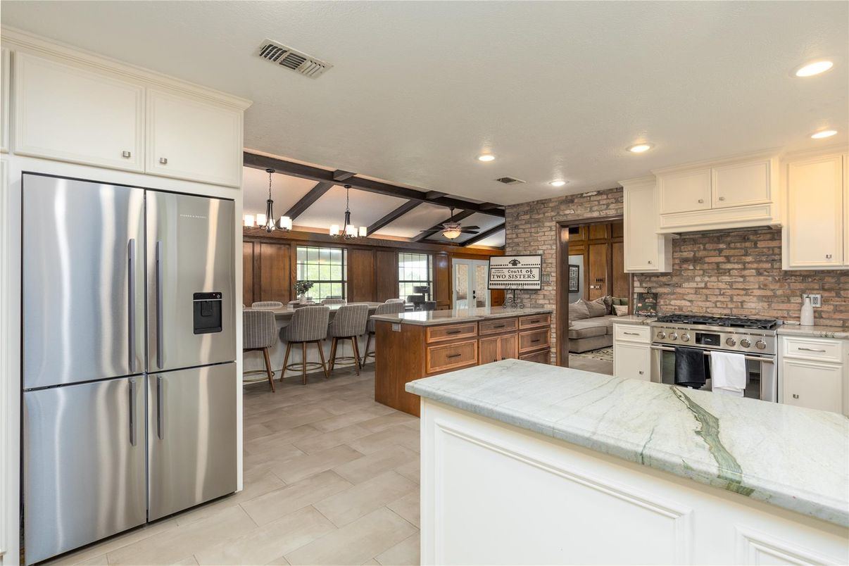 Interior, Kitchen, Pendant Lights, Recessed Lighting, Stainless Steel Appliances, Stone Walls