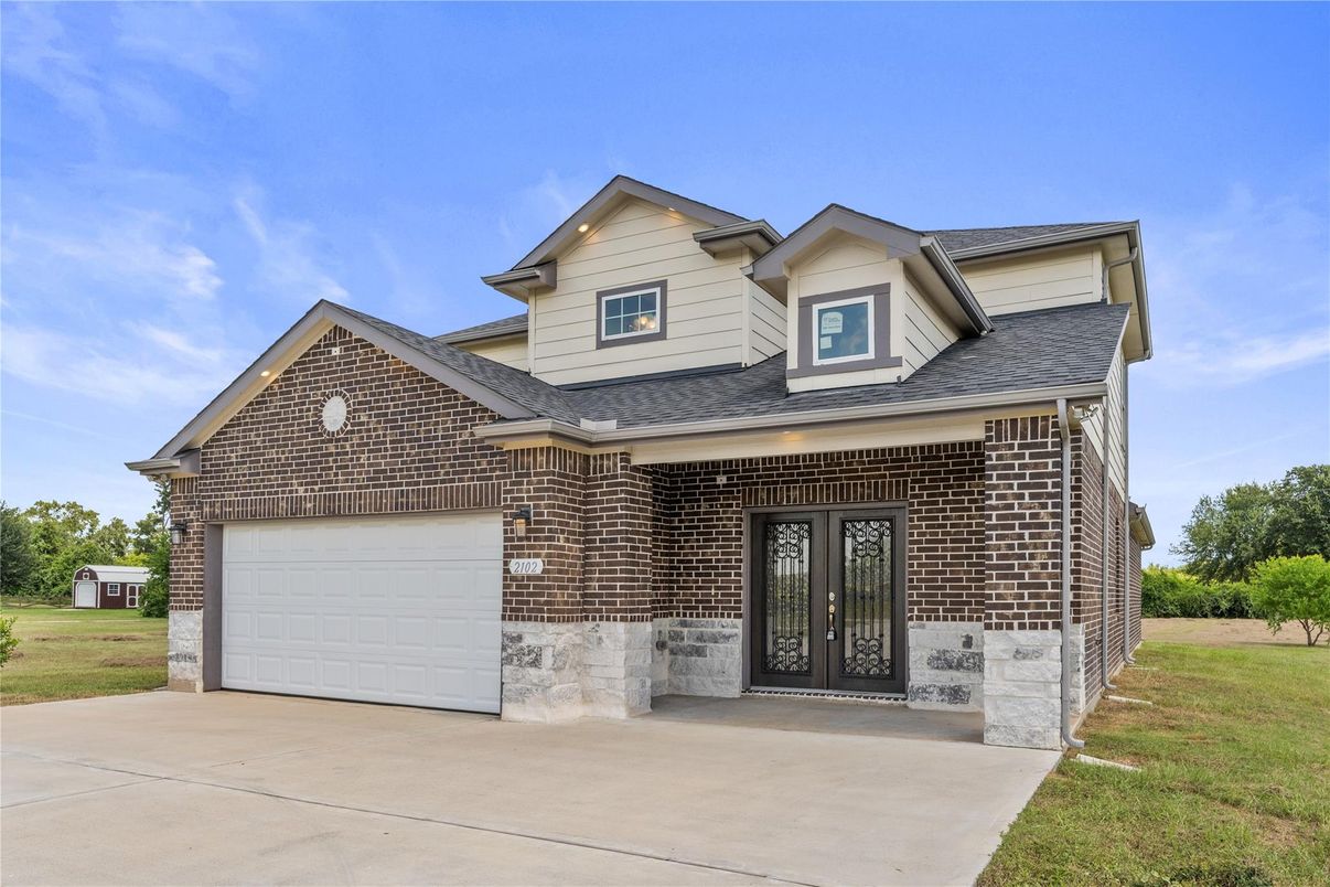Attached, Exterior, Facade, Brick Facade, Brick Traditional