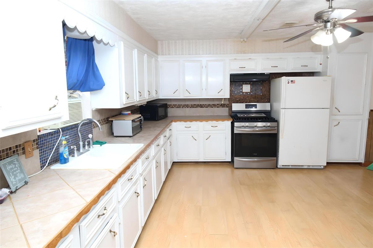 Interior, Kitchen, Tile Countertops, Wood Texture Flooring