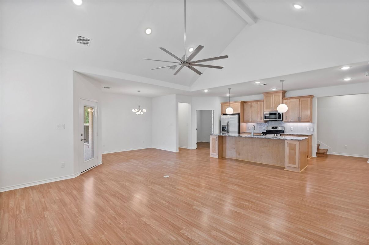 Chandelier, Empty room, Interior, Kitchen, Pendant Lights, Recessed Lighting, Stainless Steel Appliances, Wood Texture Flooring