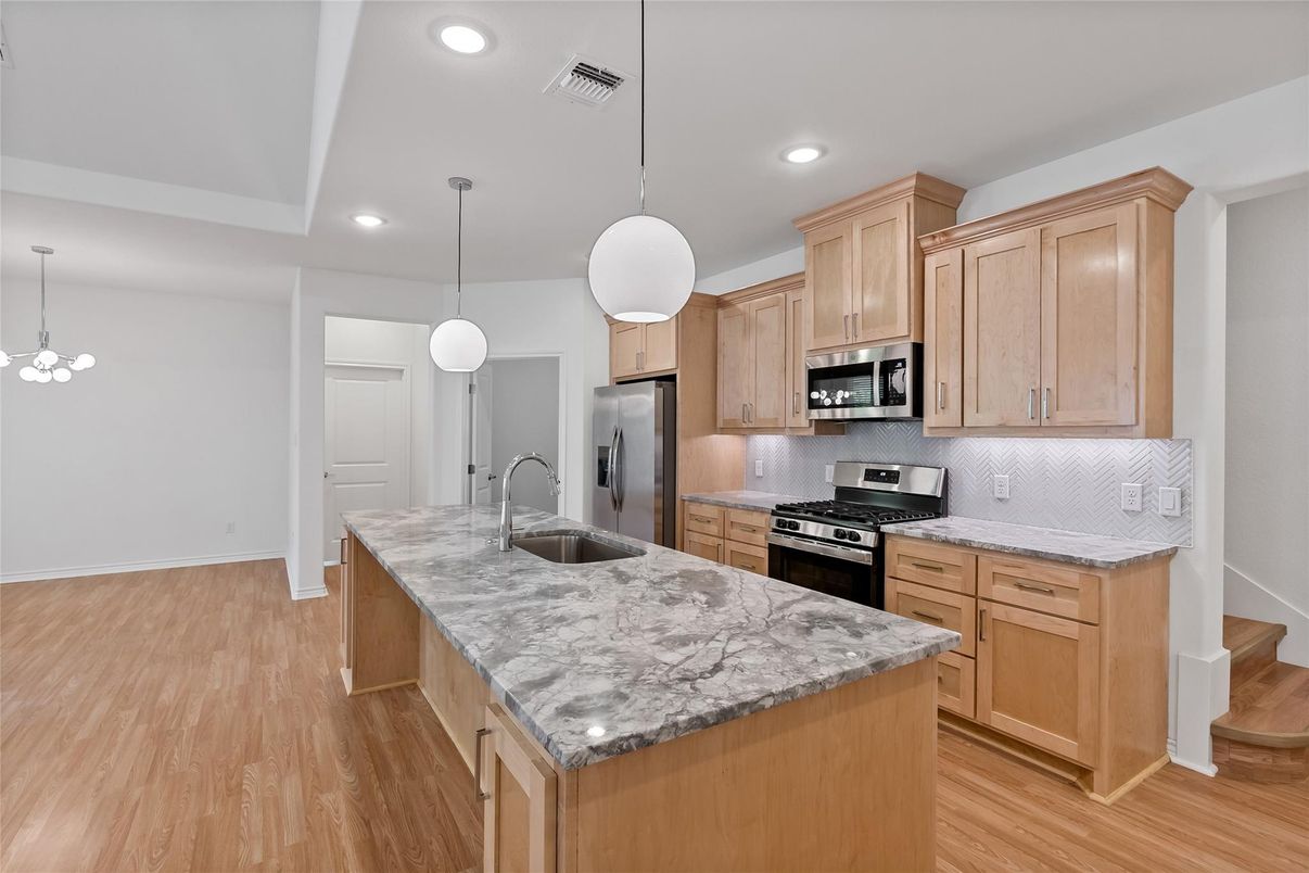 Interior, Kitchen, Pendant Lights, Recessed Lighting, Stainless Steel Appliances, Wood Texture Flooring