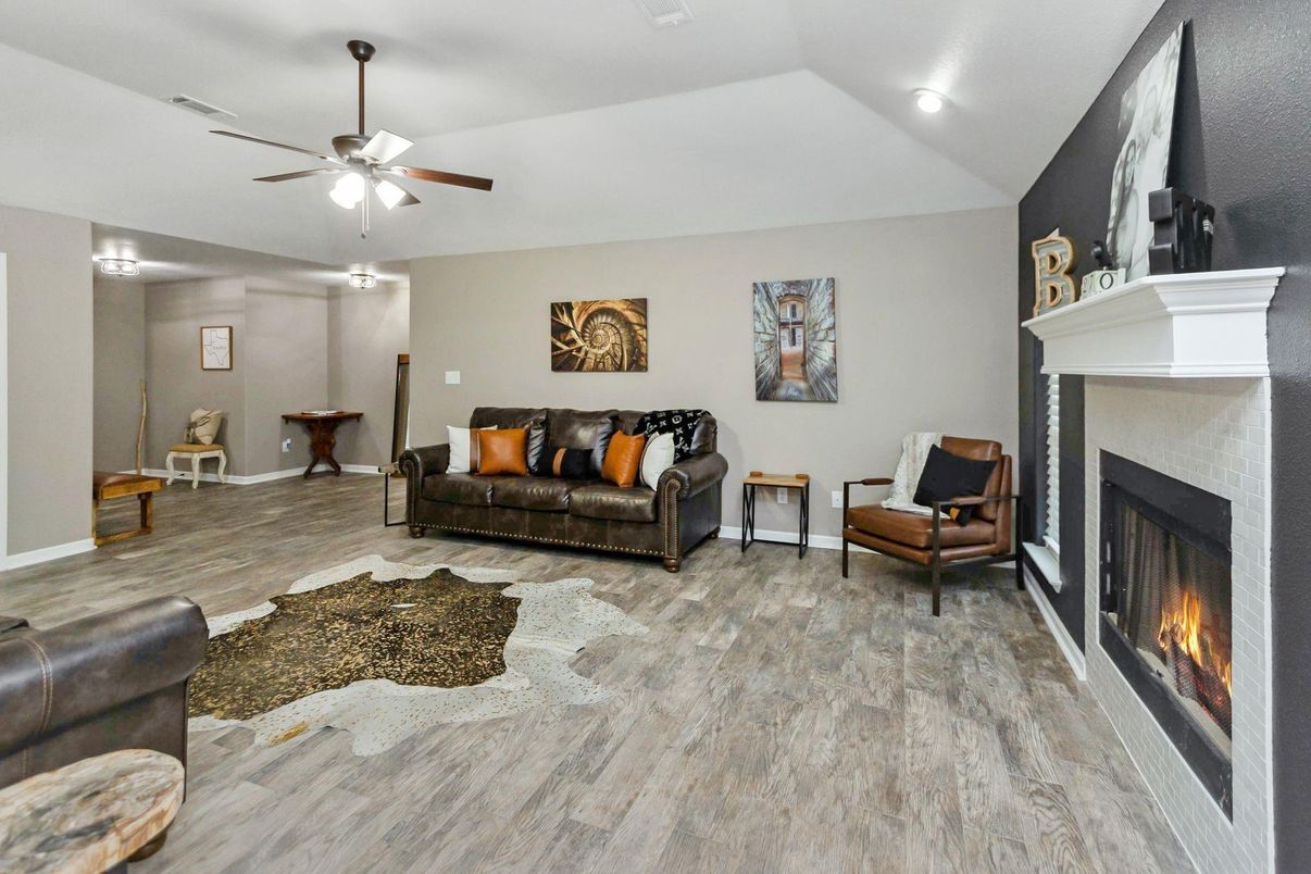 Fireplace, Interior, Living room, Recessed Lighting, Wood Texture Flooring