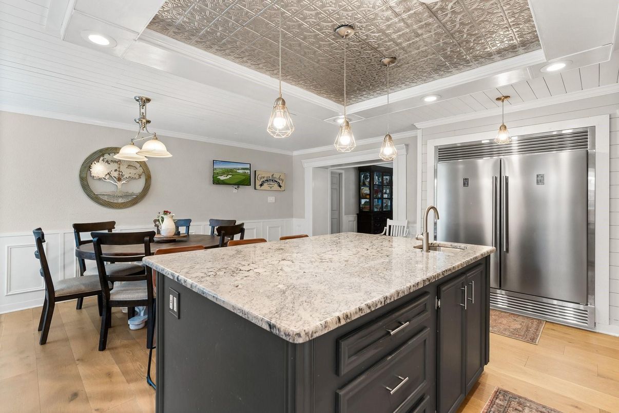 Dining room, Interior, Kitchen, Pendant Lights, Recessed Lighting, Stainless Steel Appliances, Wood Texture Flooring