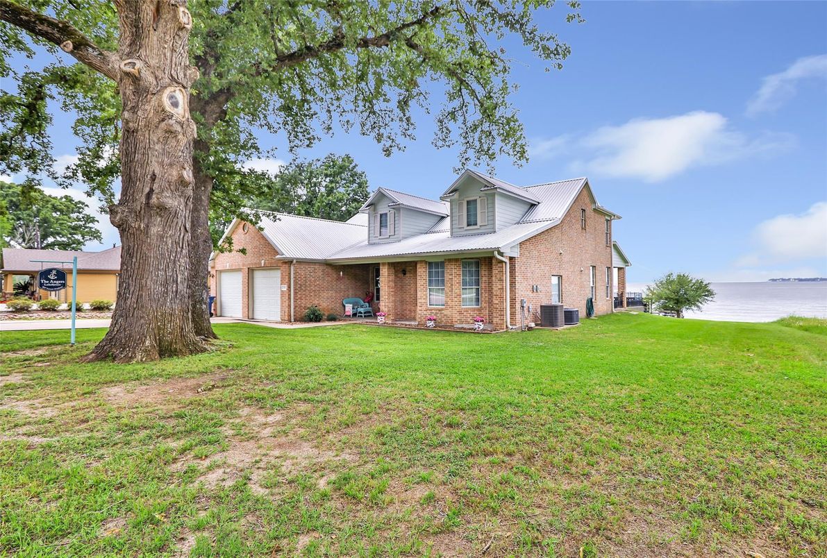 Attached, Backyard, Exterior, Facade, Brick Facade, Farmhouse