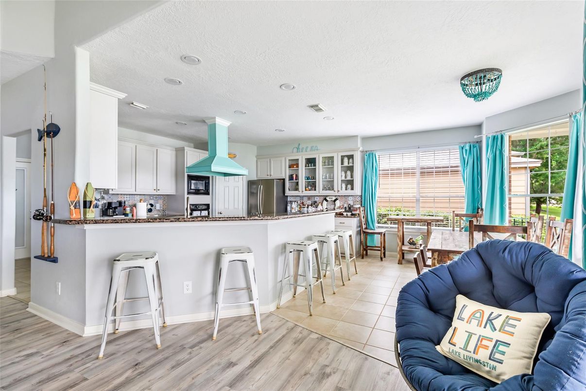 Dining room, Interior, Kitchen, Recessed Lighting, Stainless Steel Appliances, Wood Texture Flooring