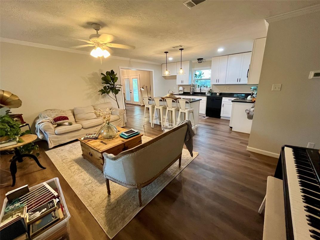 Dining room, Interior, Kitchen, Living room, Pendant Lights, Piano, Recessed Lighting, Wood Texture Flooring