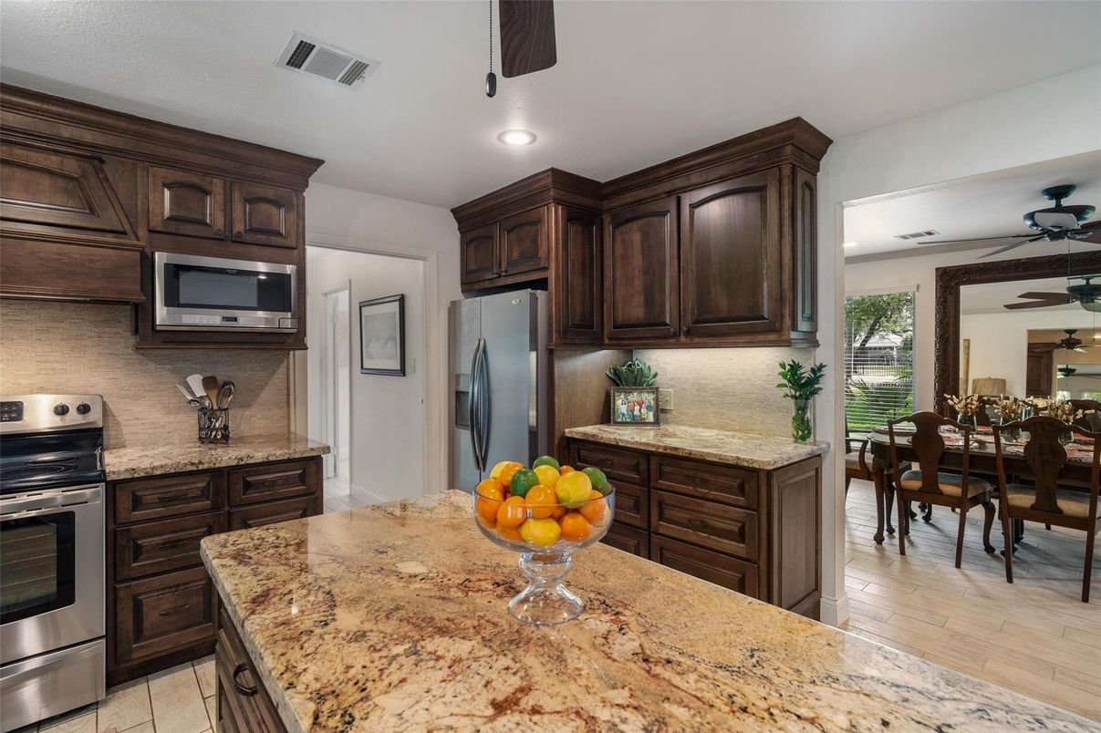 Dining room, Interior, Kitchen, Recessed Lighting, Stainless Steel Appliances, Wood Texture Flooring