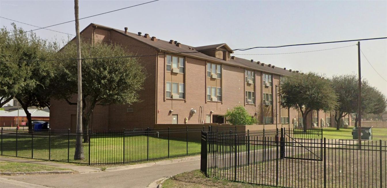 Exterior, Facade, Brick Facade, Condo Building