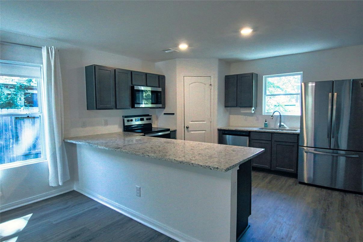 Interior, Kitchen, Recessed Lighting, Stainless Steel Appliances, Wood Texture Flooring