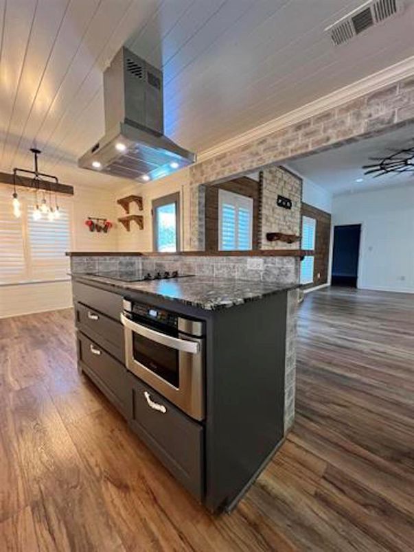 Interior, Kitchen, Pendant Lights, Stainless Steel Appliances, Stone Walls, Wood Texture Flooring
