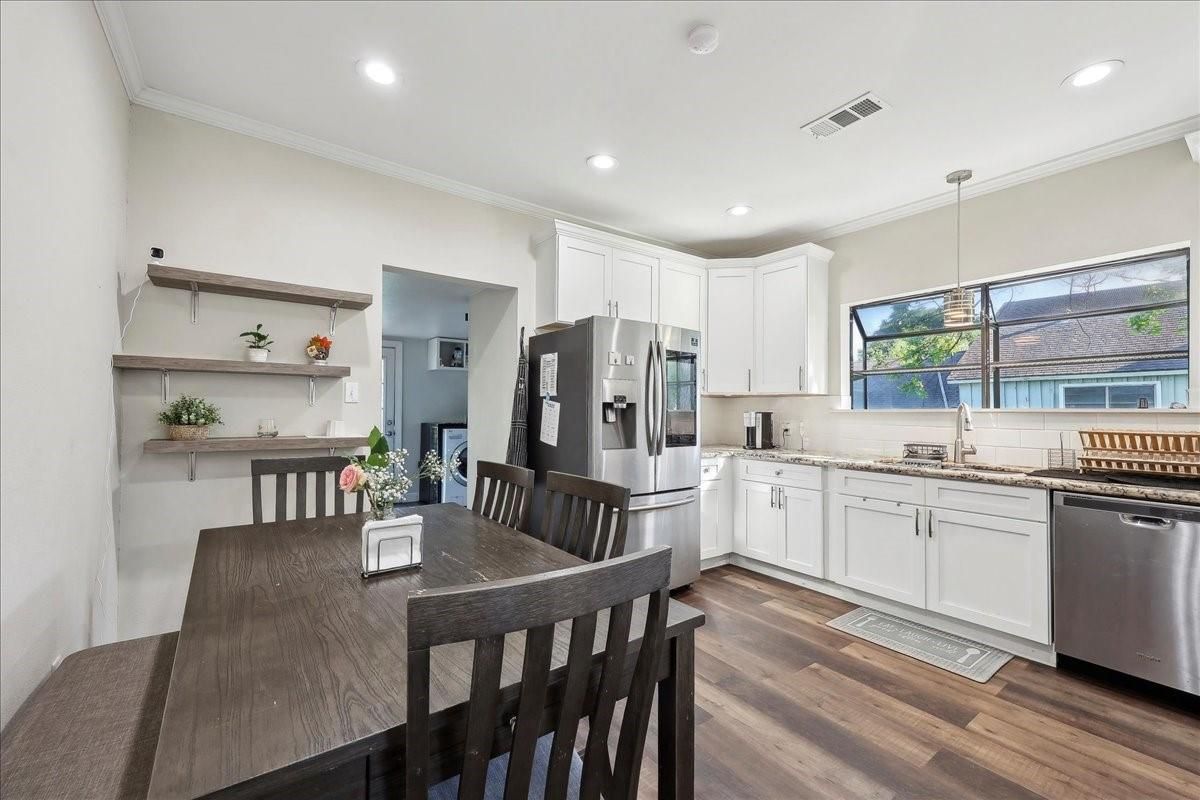 Dining room, Interior, Kitchen, Pendant Lights, Recessed Lighting, Stainless Steel Appliances, Wood Texture Flooring