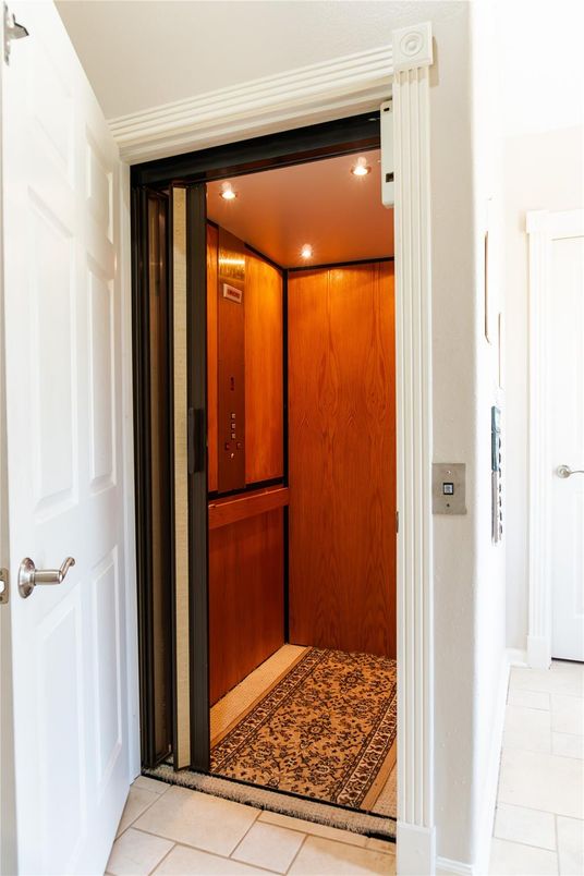 Elevator, Interior, Recessed Lighting, Wooden Walls