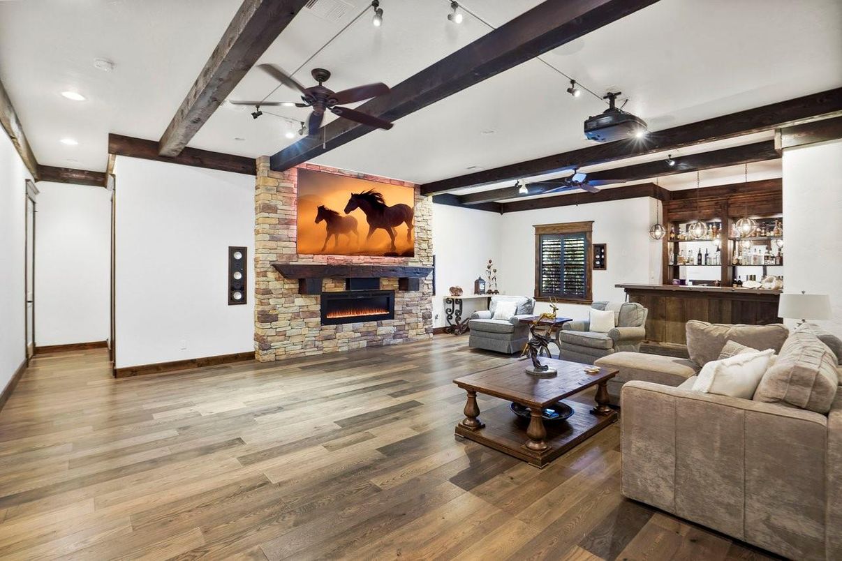 Fireplace, Interior, Living room, Pendant Lights, Recessed Lighting, Stone Walls, Wooden Beams, Wood Texture Flooring