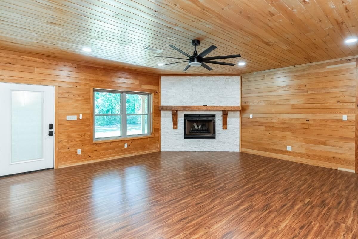 Empty room, Fireplace, Interior, Recessed Lighting, Wooden Ceilings, Wood Texture Flooring, Wooden Walls