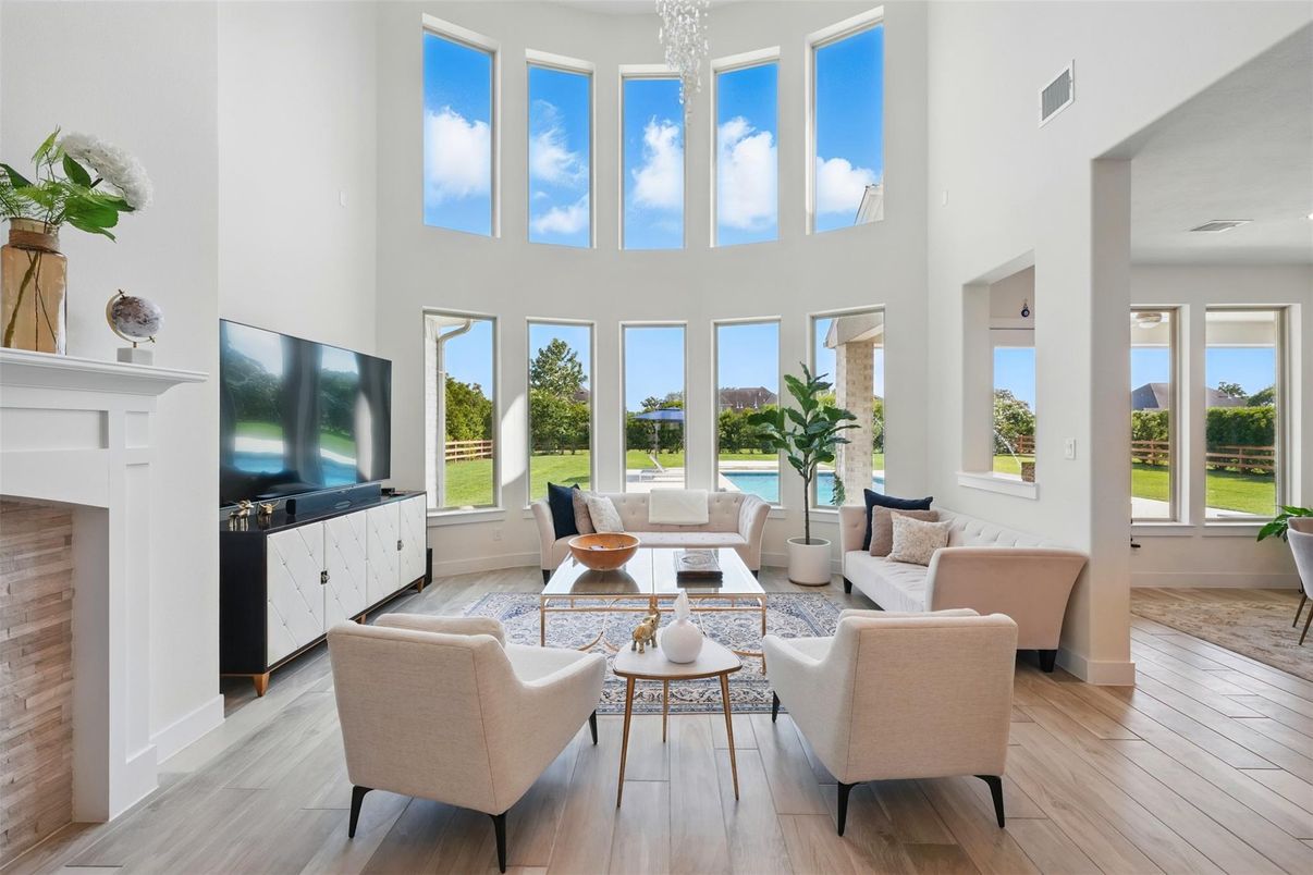 Chandelier, Fireplace, Interior, Living room, Water, Wood Texture Flooring