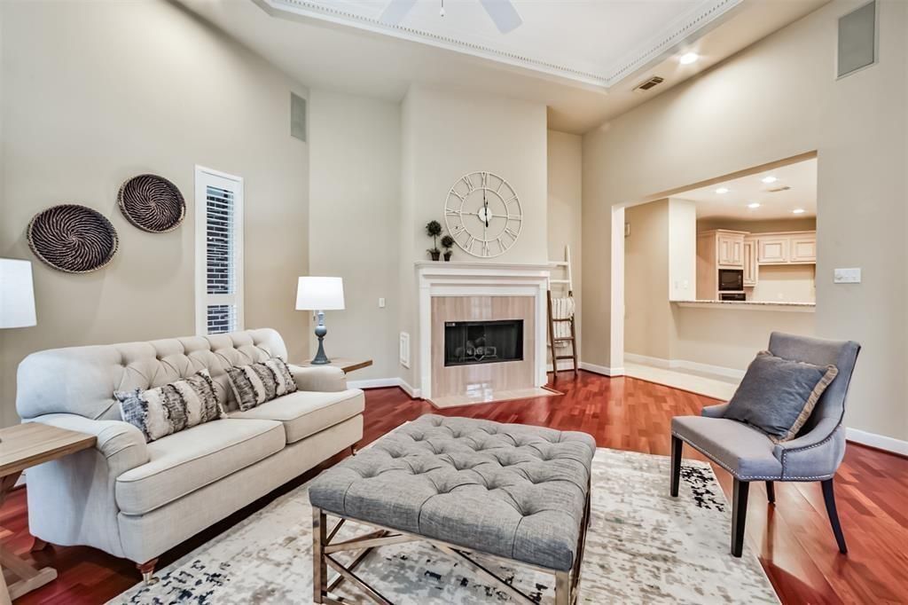 Fireplace, Interior, Kitchen, Living room, Recessed Lighting, Stainless Steel Appliances, Wood Texture Flooring