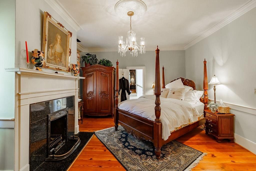 Bedroom, Chandelier, Fireplace, Interior, Wood Texture Flooring