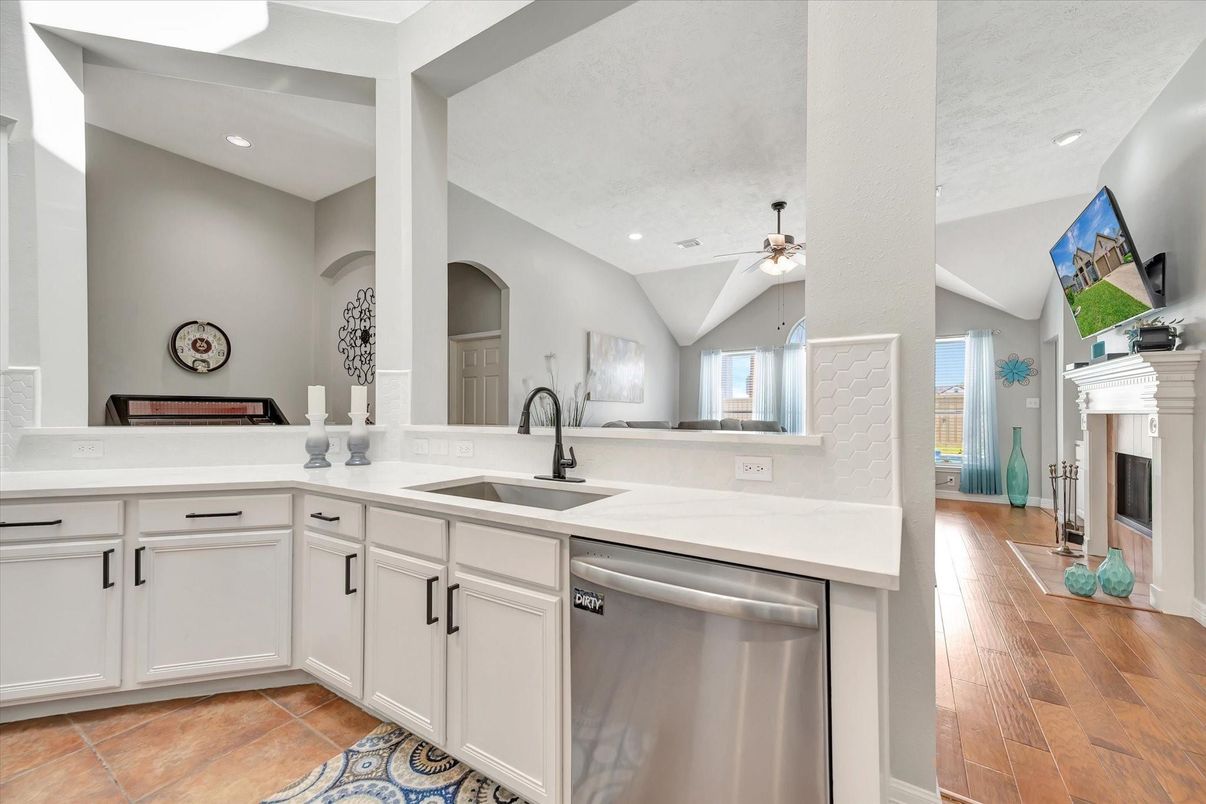 Fireplace, Interior, Kitchen, Recessed Lighting, Stainless Steel Appliances