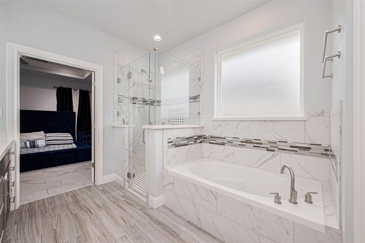 Bathroom, Bedroom, Glass Shower, Interior, Marble, Marble Walls, Recessed Lighting, Wood Texture Flooring