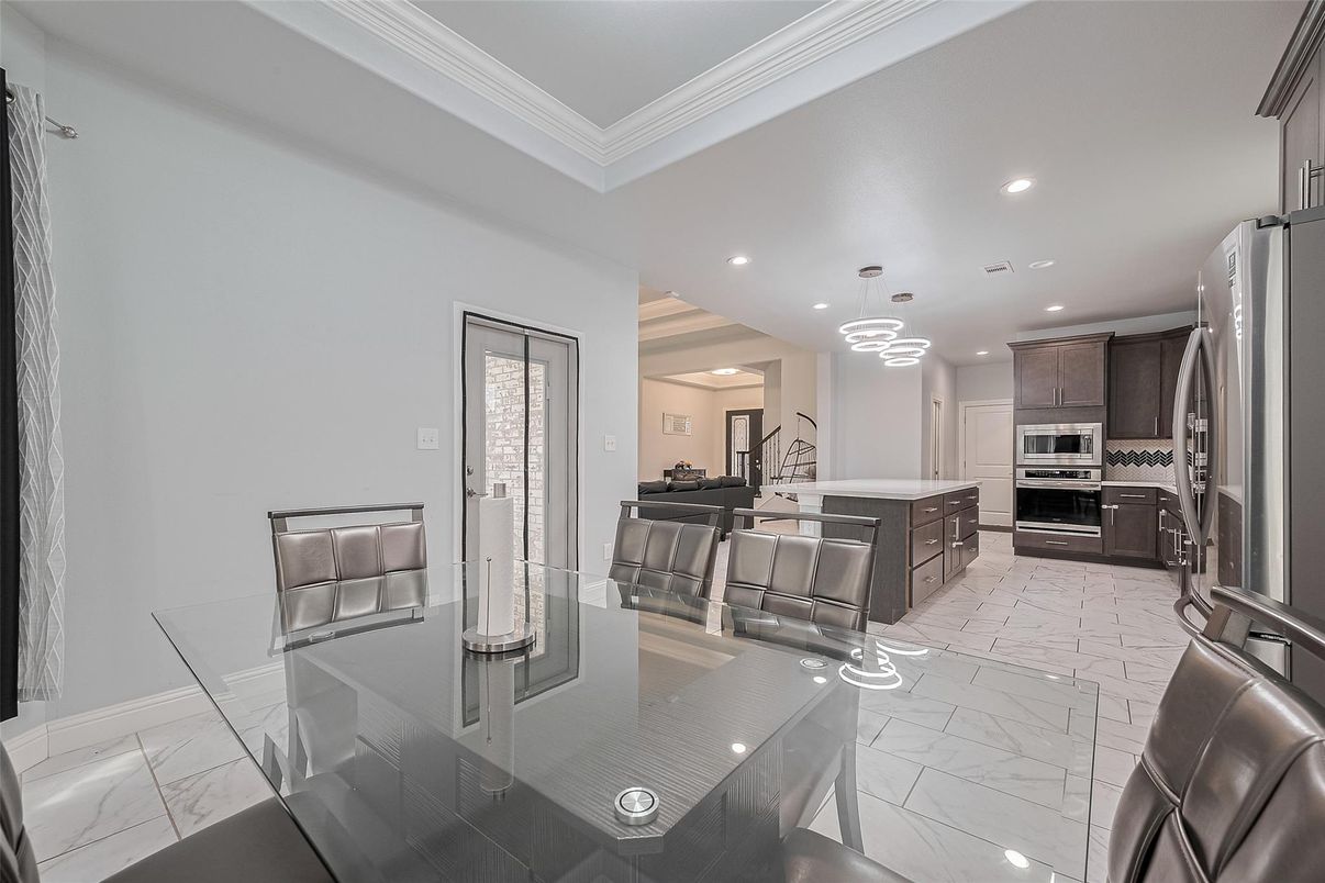Dining room, Interior, Kitchen, Marble, Pendant Lights, Recessed Lighting, Stainless Steel Appliances