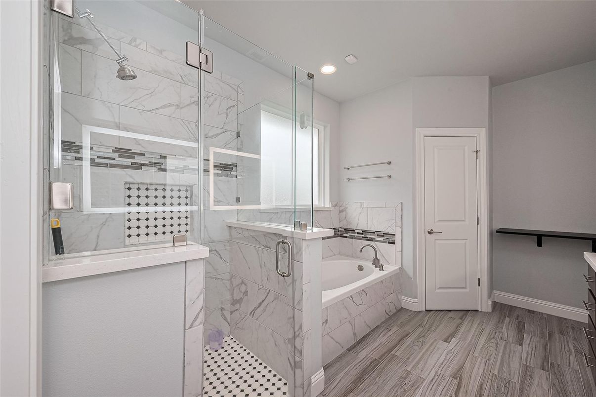 Bathroom, Glass Shower, Interior, Marble Walls, Recessed Lighting, Wood Texture Flooring