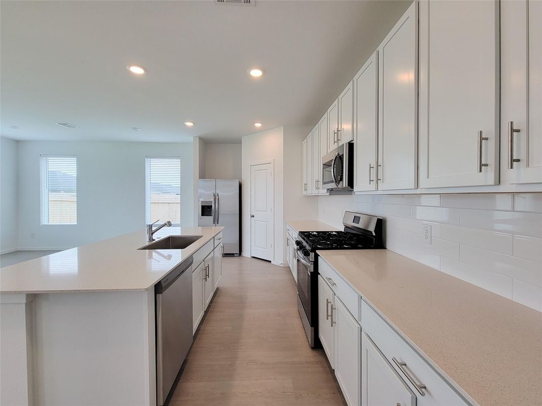 Interior, Kitchen, Recessed Lighting, Stainless Steel Appliances, Wood Texture Flooring