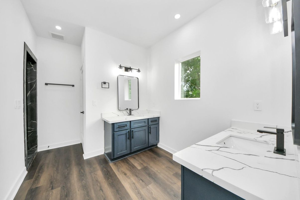 Bathroom, Dual Sink Vanities, Interior, Recessed Lighting, Wood Texture Flooring