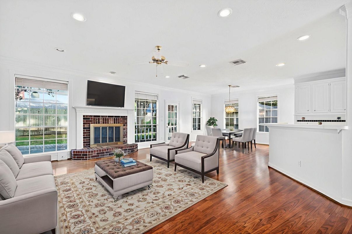 Dining room, Fireplace, Interior, Living room, Pendant Lights, Recessed Lighting, Wood Texture Flooring