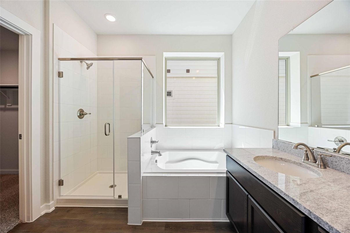 Bathroom, Dual Sink Vanities, Glass Shower, Interior, Recessed Lighting, Wood Texture Flooring