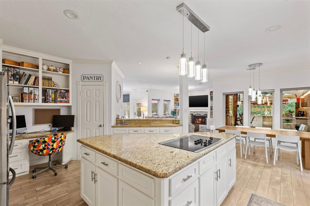 Dining room, Fireplace, Interior, Pendant Lights, Recessed Lighting, Wood Texture Flooring