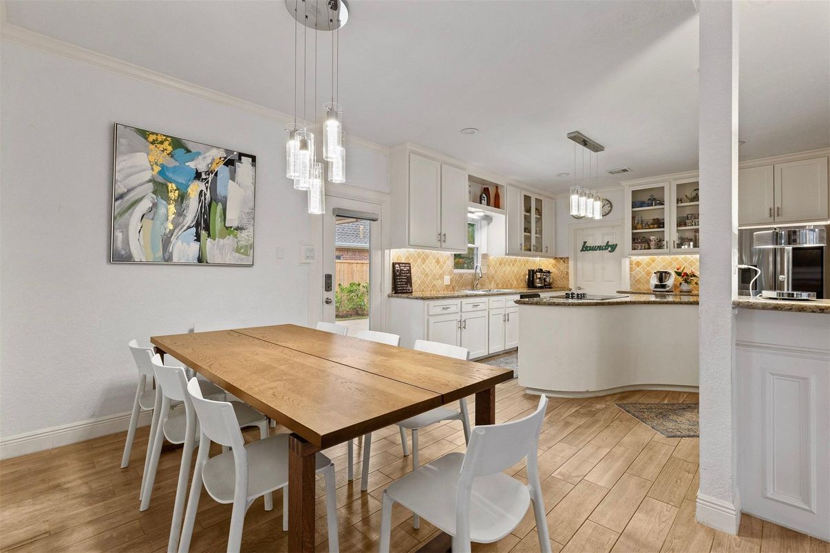 Dining room, Interior, Kitchen, Pendant Lights, Stainless Steel Appliances, Wood Texture Flooring