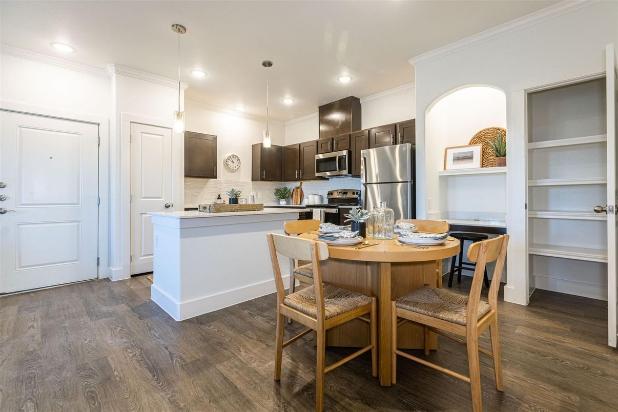 Dining room, Interior, Kitchen, Pendant Lights, Recessed Lighting, Stainless Steel Appliances, Wood Texture Flooring