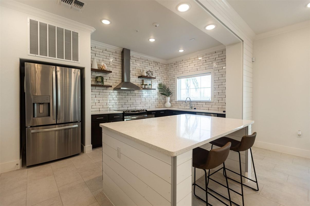 Interior, Kitchen, Recessed Lighting, Stainless Steel Appliances, Stone Walls