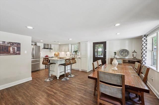 Dining room, Interior, Kitchen, Recessed Lighting, Stainless Steel Appliances, Wood Texture Flooring