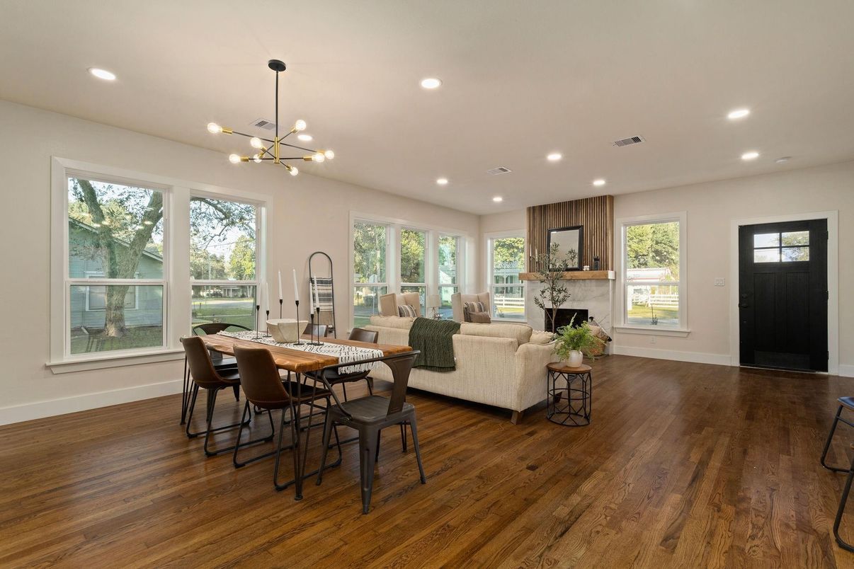 Dining room, Fireplace, Interior, Living room, Pendant Lights, Recessed Lighting, Wood Texture Flooring