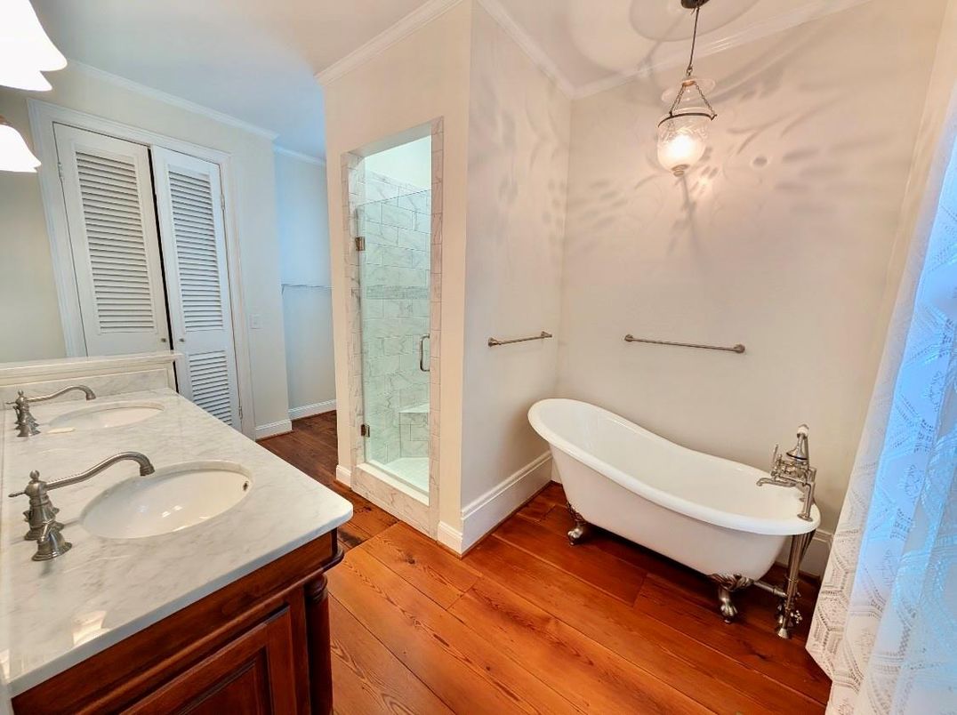 Bathroom, Dual Sink Vanities, Free Standing Baths, Glass Shower, Interior, Pendant Lights, Wood Texture Flooring