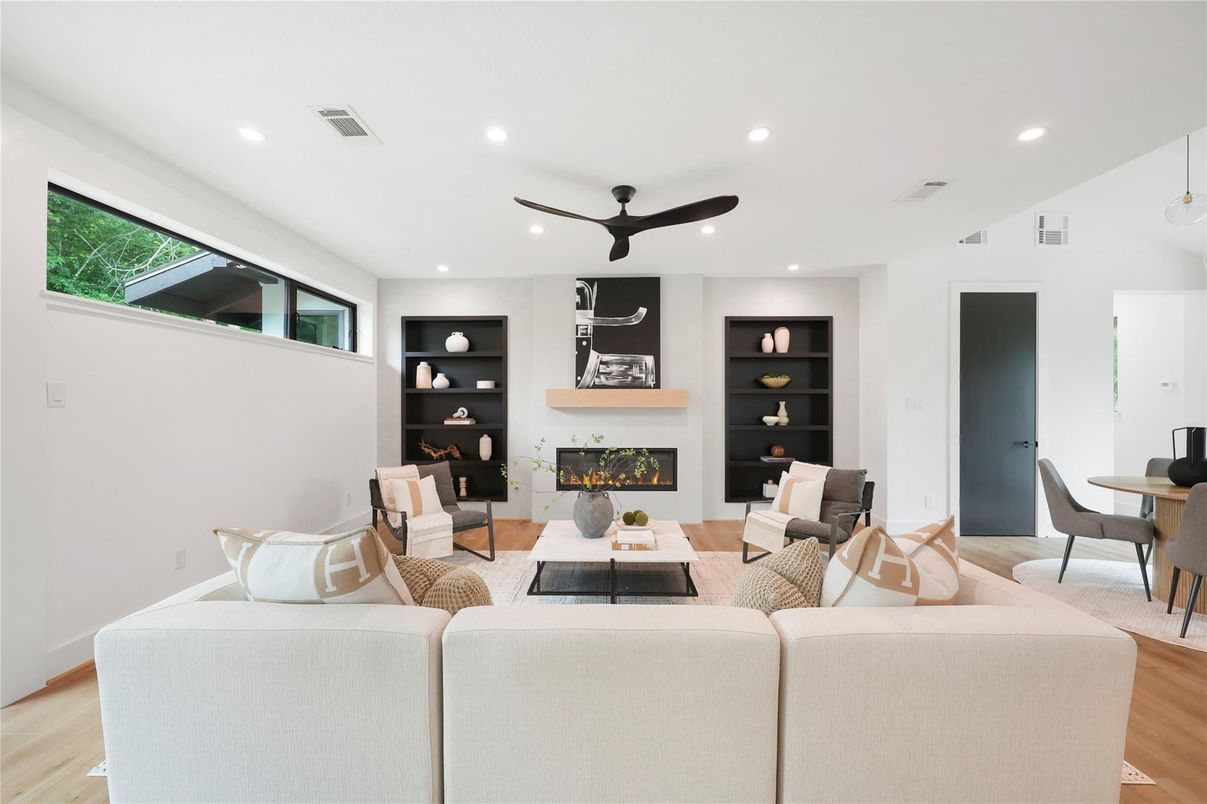 Dining room, Fireplace, Interior, Living room, Pendant Lights, Recessed Lighting, Wood Texture Flooring