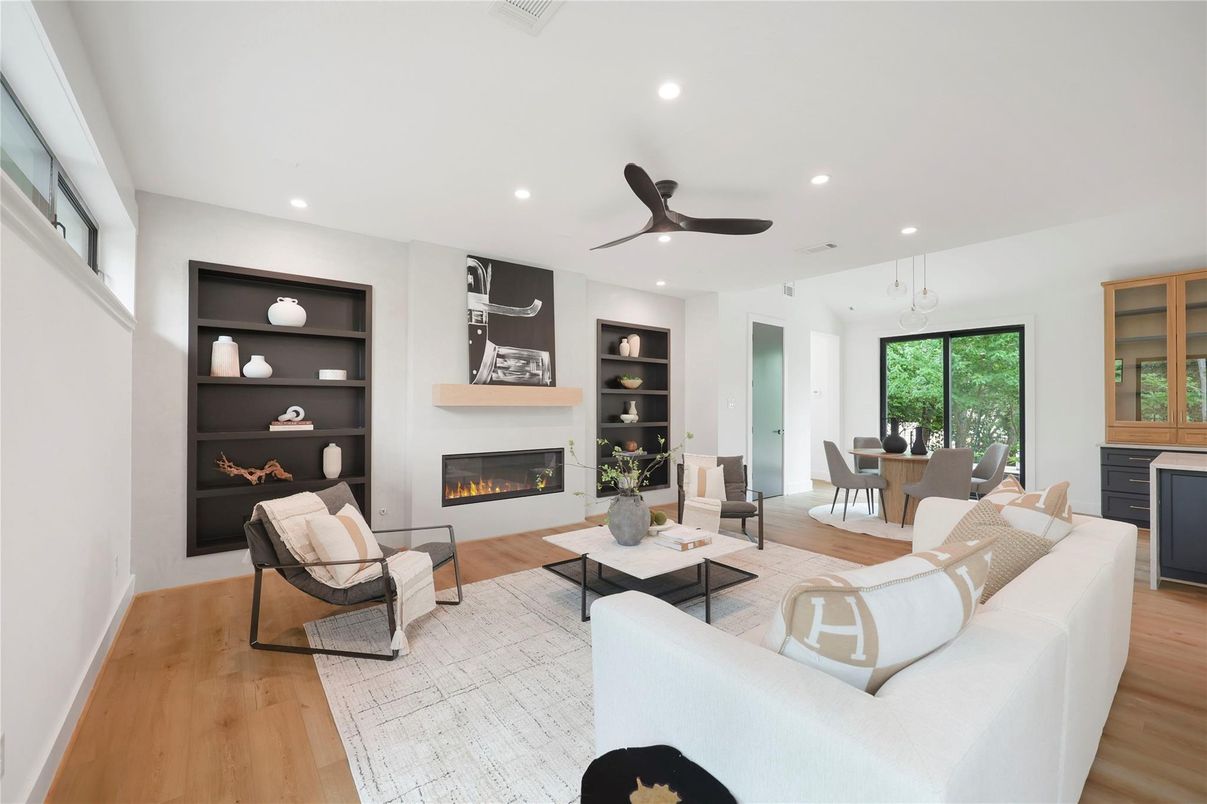 Dining room, Fireplace, Interior, Living room, Recessed Lighting, Wood Texture Flooring