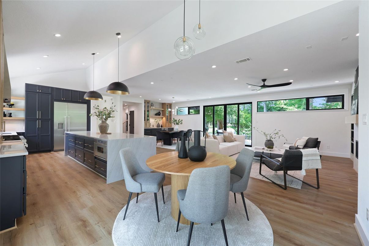 Dining room, Interior, Kitchen, Living room, Pendant Lights, Recessed Lighting, Stainless Steel Appliances, Wood Texture Flooring