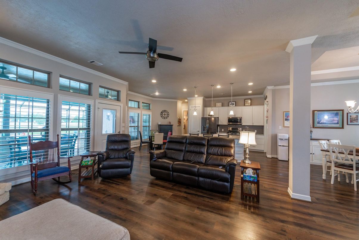 Dining room, Interior, Kitchen, Living room, Pendant Lights, Recessed Lighting, Stainless Steel Appliances, Wood Texture Flooring