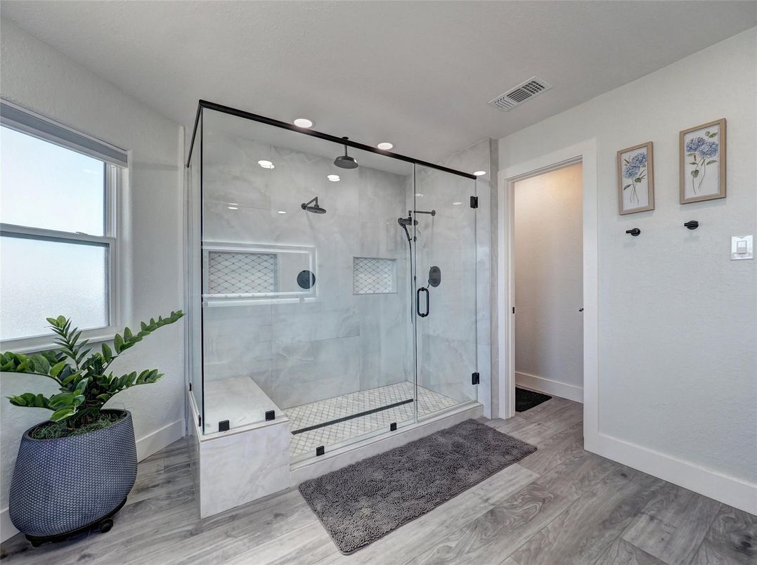 Bathroom, Glass Shower, Interior, Marble Walls, Recessed Lighting, Wood Texture Flooring