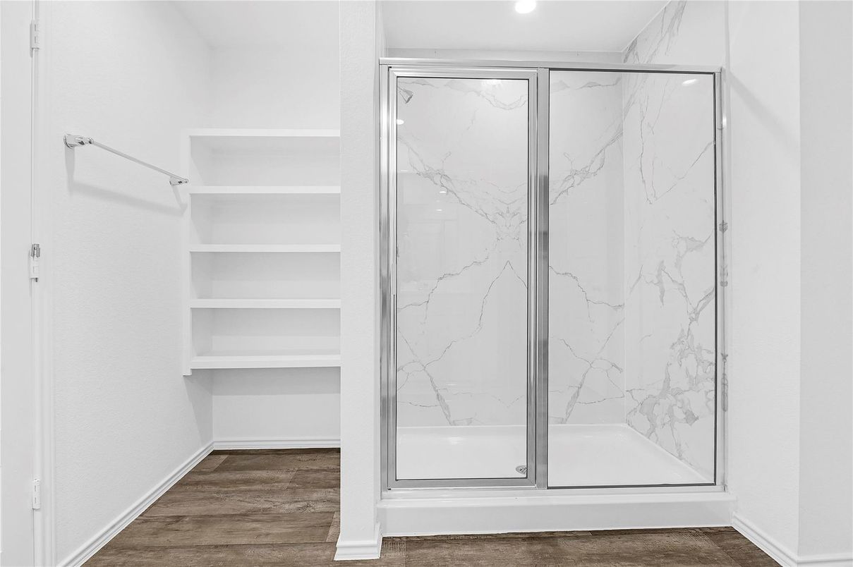 Bathroom, Glass Shower, Interior, Marble Walls, Recessed Lighting, Wood Texture Flooring